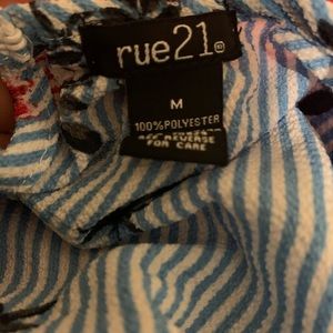 blue and white striped shirt with flowers on it